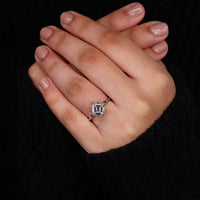 Compass prong setting in simple engagement ring.
