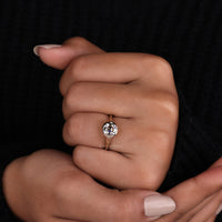 Signet engagement ring made in bezel set ring style.