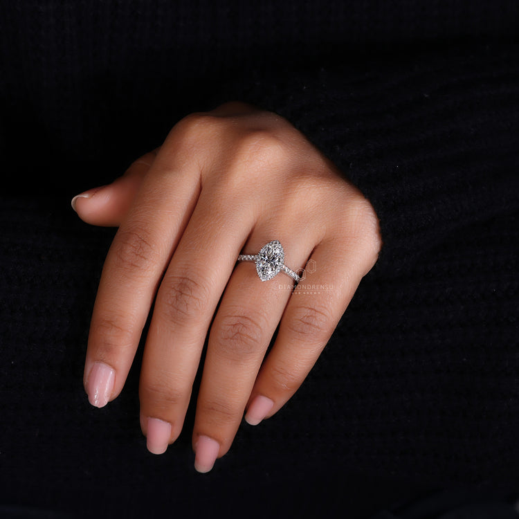 Designer halo diamond ring in white gold.