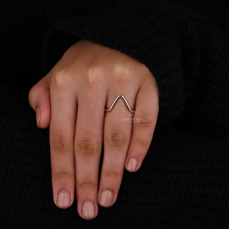Simple yellow gold wedding band.