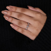 Prong setting ring paired with round side stone ring.