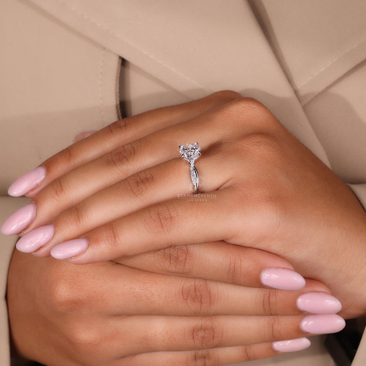 IGI certified diamond ring featuring a handmade round pave setting.