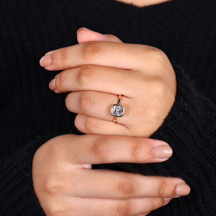 IGI certified cushion bezel set ring style.