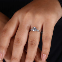 Milgrain ring with classic round prong style.
