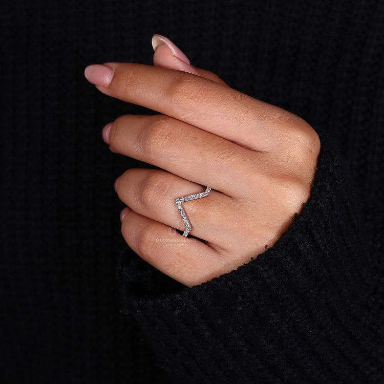 Pointed diamond band in modern style.