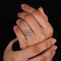 Pear side stone in 3 stone engagement ring.