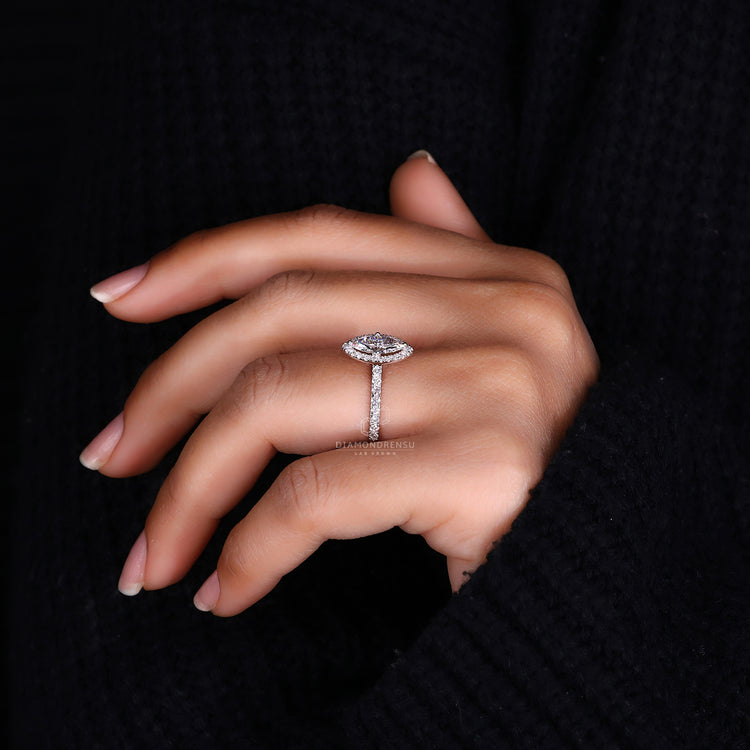 Handmade round cut halo diamond ring by Diamondrensu AU.