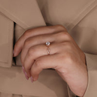 Rose gold ring with round cut lab grown diamond and solitaire setting.