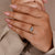 Half bezel engagement ring with a marquise diamond in a classic design