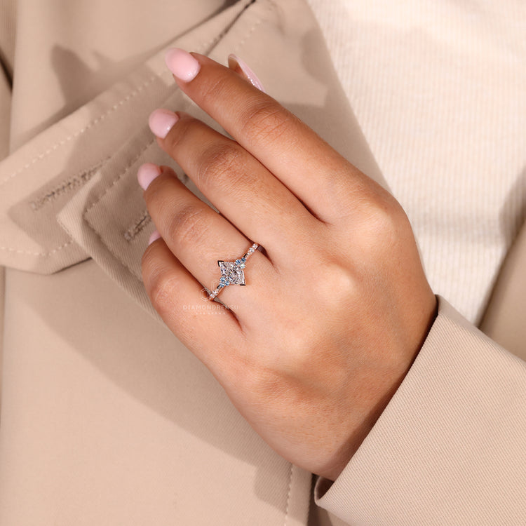 Customise ring with blue round diamond.