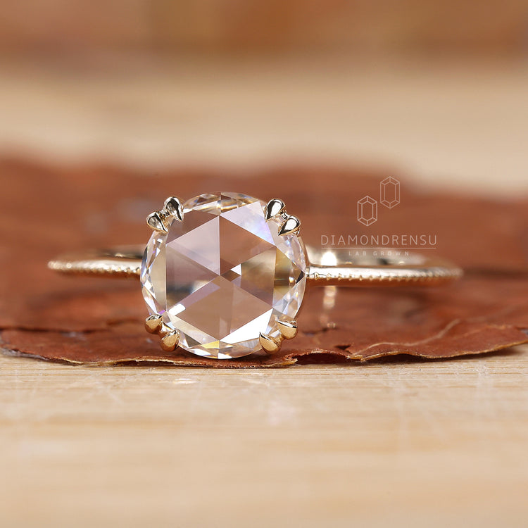 Round rose cut ring with a knife edge shank ring.
