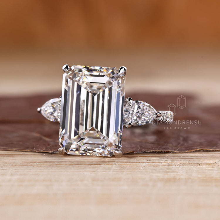 Emerald Cut Diamond Ring four claw prong setting.