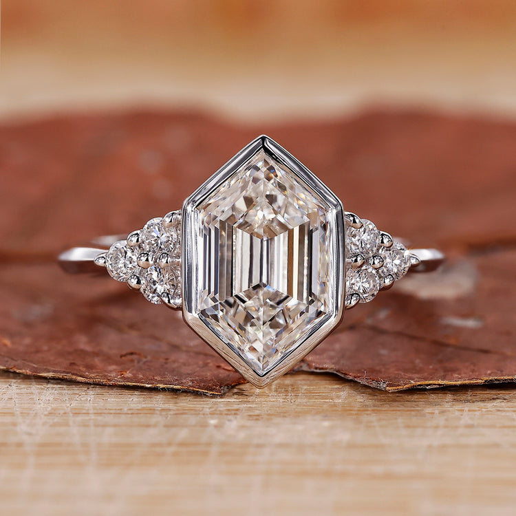 Bezel set diamond ring with hexagon cut diamond ring style.