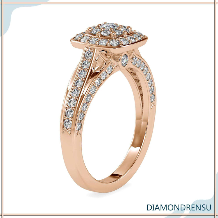 Exquisite round brilliant cut diamond with a double halo and bridge accent.