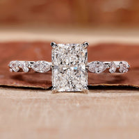 This is a radiant cut diamond ring for a shiny look.