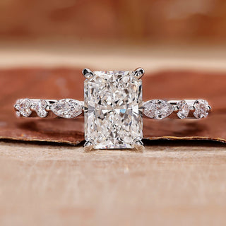 This is a radiant cut diamond ring for a shiny look.