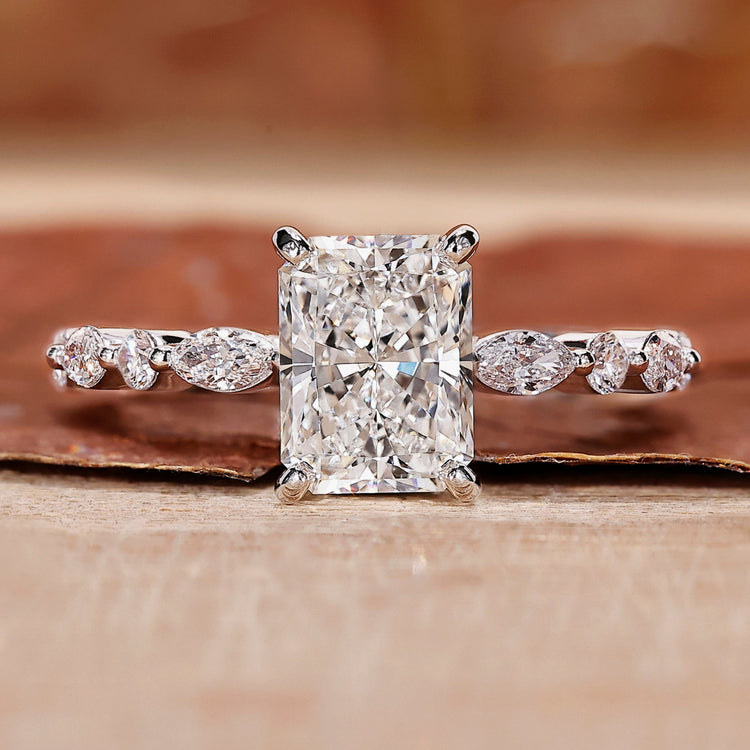 This is a radiant cut diamond ring for a shiny look.
