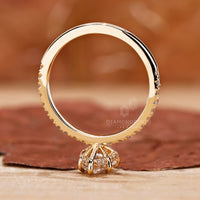 Yellow gold engagement ring with 5 claw prong setting