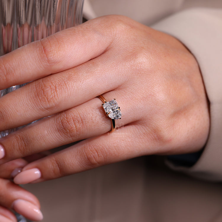 Yellow gold engagement ring made in toi et moi style.