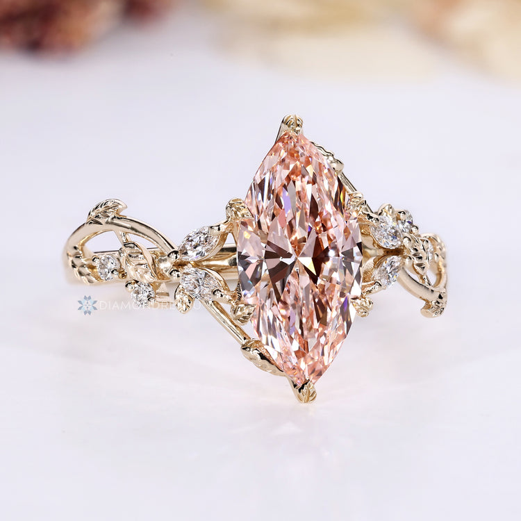 Nature inspired ring with pink marquise diamond.