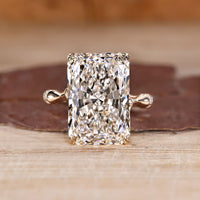 Radiant Cut Diamond Ring with distance pave diamonds.