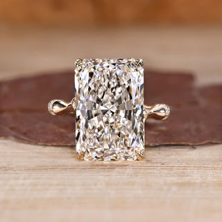 Radiant Cut Diamond Ring with distance pave diamonds.