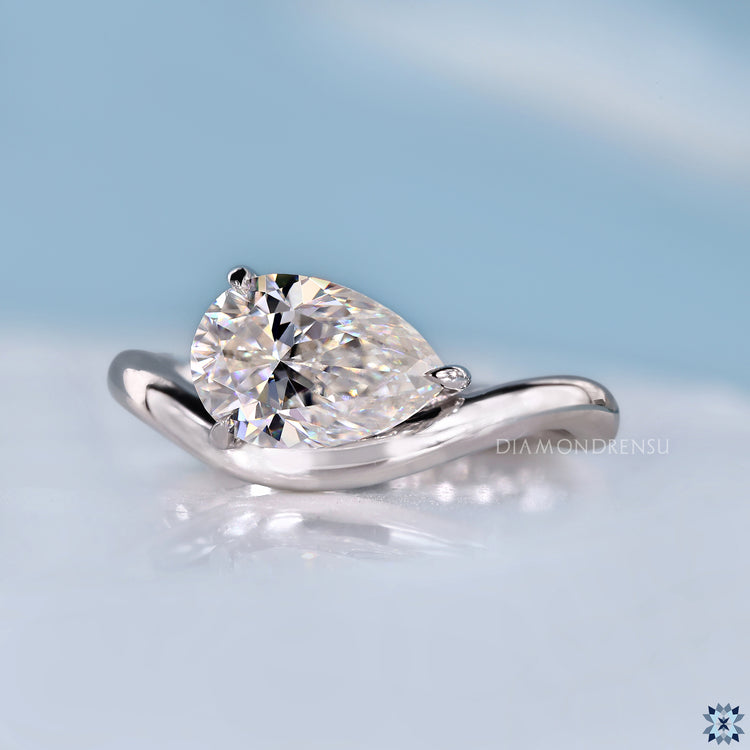 Pear Moissanite Curved Solitaire East West Ring 1.24 CT - Silver - Size G