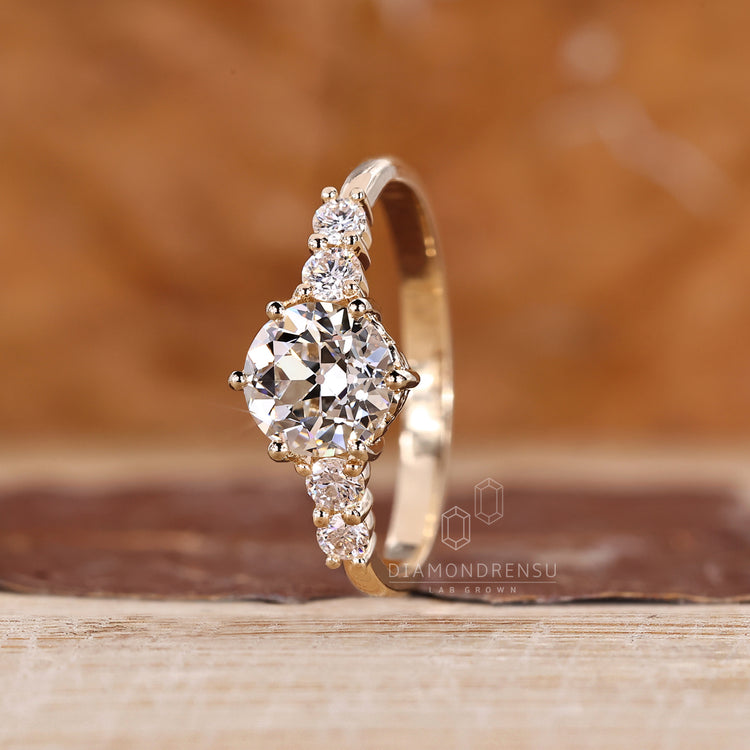 IGI certified round old cut ring six prong setting.