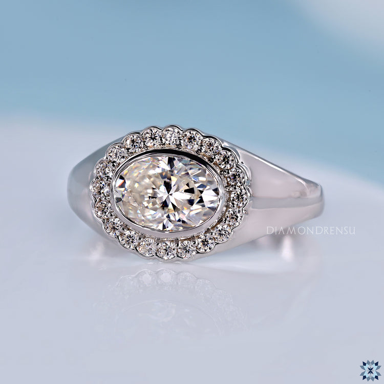 East to west oval diamond engagement ring design.