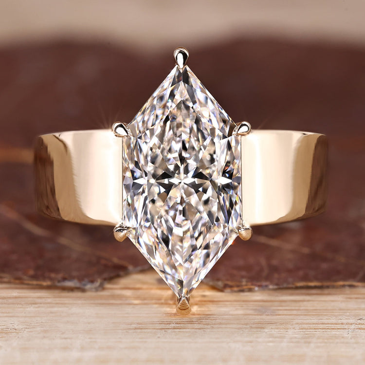 Solitaire diamond ring with Dutch marquise engagement design.