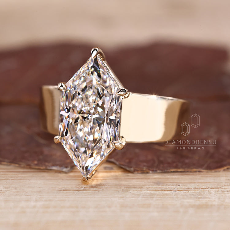 Six claw prong setting ring with Dutch marquise diamond.