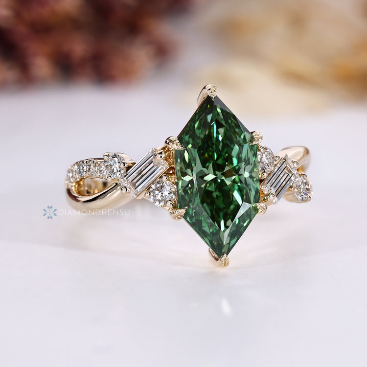 Green diamond Dutch marquise ring with leaf prongs.