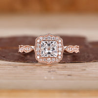 Princess Cut Diamond Ring with pave round diamonds.
