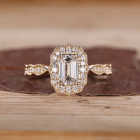 Emerald Cut Diamond Ring with pave round diamonds.