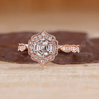 Hexagon Cut Diamond Ring with milgrain detailing.