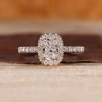Halo Engagement Ring with oval cut lab grown diamond.