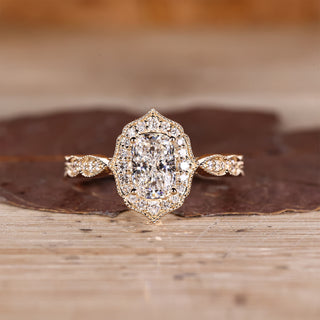 Cushion Cut Diamond Ring with pave round diamonds.