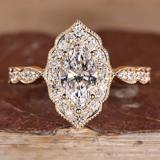 Marquise Diamond Ring with pave round diamonds.