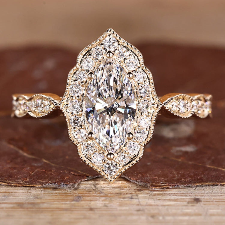 Marquise Diamond Ring with pave round diamonds.