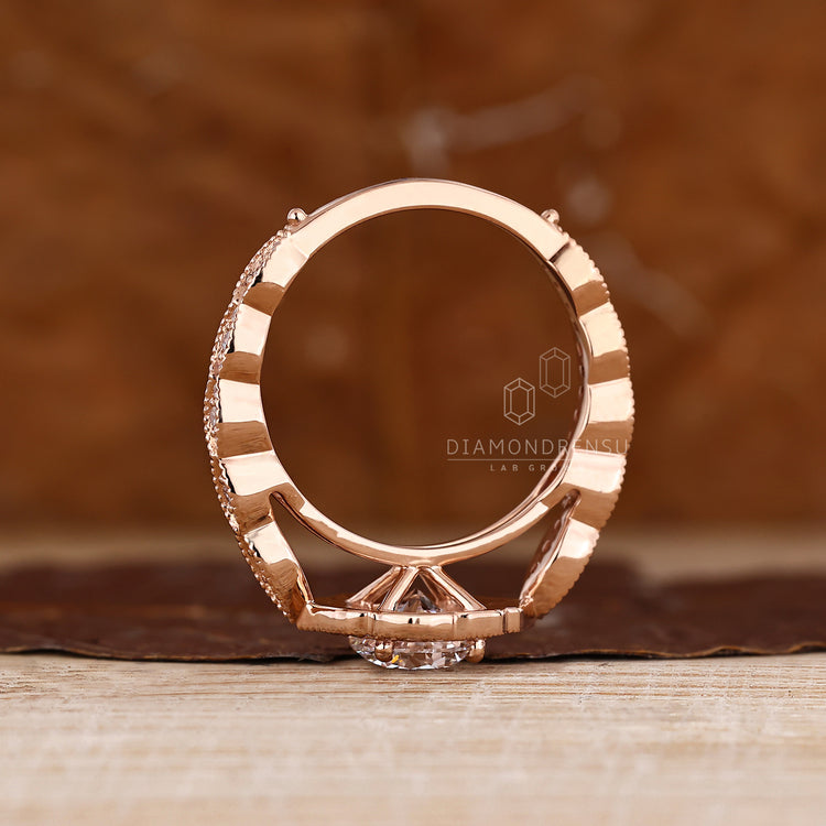 Round Cut Diamond Ring with milgrain pave finish.