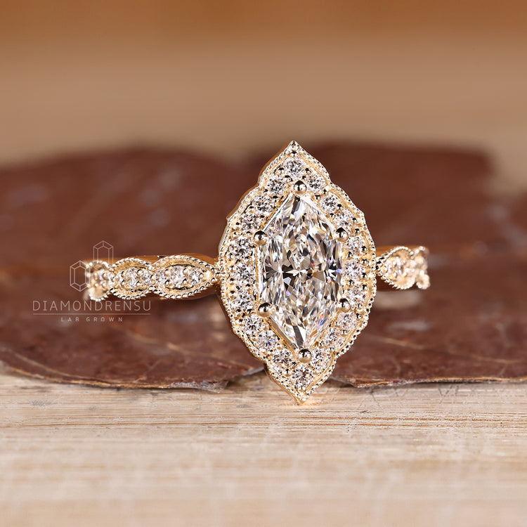 Dutch Marquise Diamond Ring with round diamond pave.