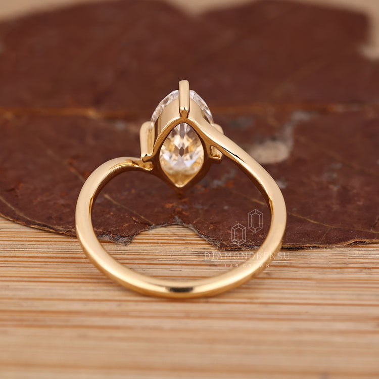 Marquise Old European Cut Ring classic bypass style.