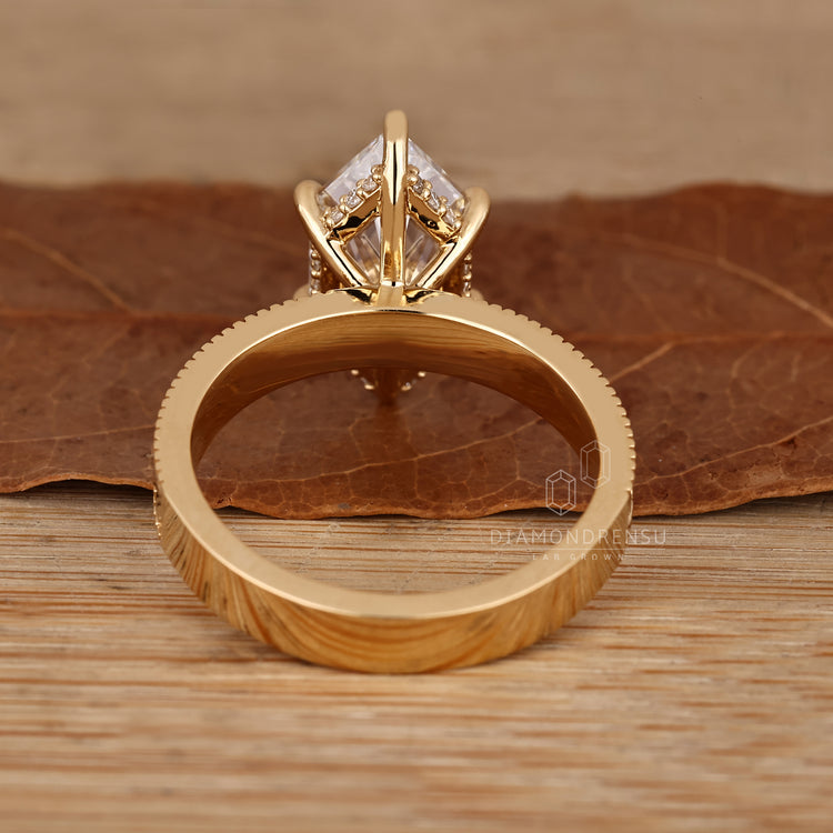 Dutch marquise ring claw prong halo setting.