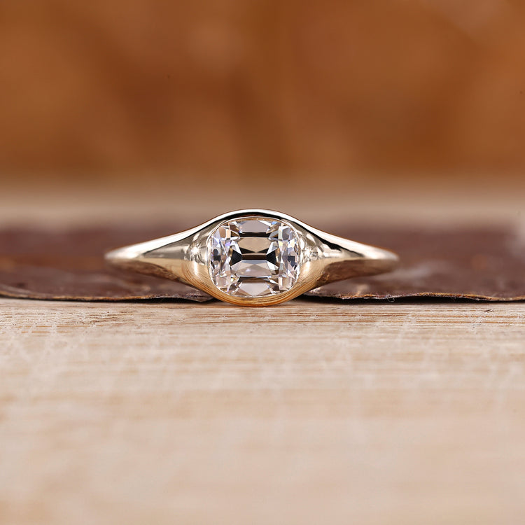 Cushion Old Mine Cut Ring east to west setting.