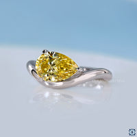 Lab grown pear diamond or moissanite ring design.
