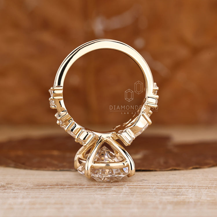 Oval Cut Diamond Ring with marquise diamond accents.