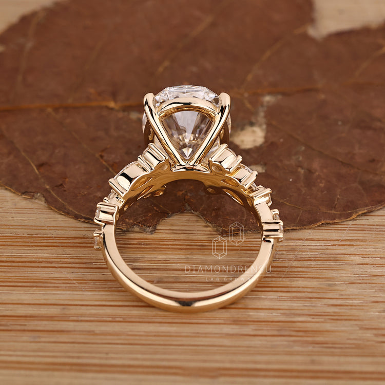 Lab Grown Oval Cut Diamond Ring with side stones.