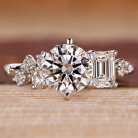 Round cut diamond ring with six tab prong setting.