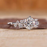 White gold round cut diamond engagement ring.