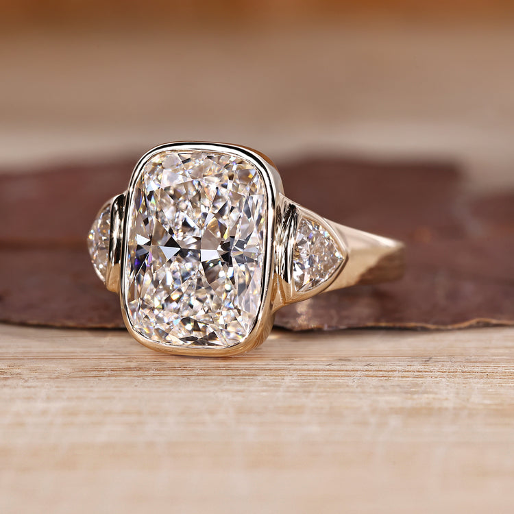 Cushion Cut Diamond Ring with tapered shank style.